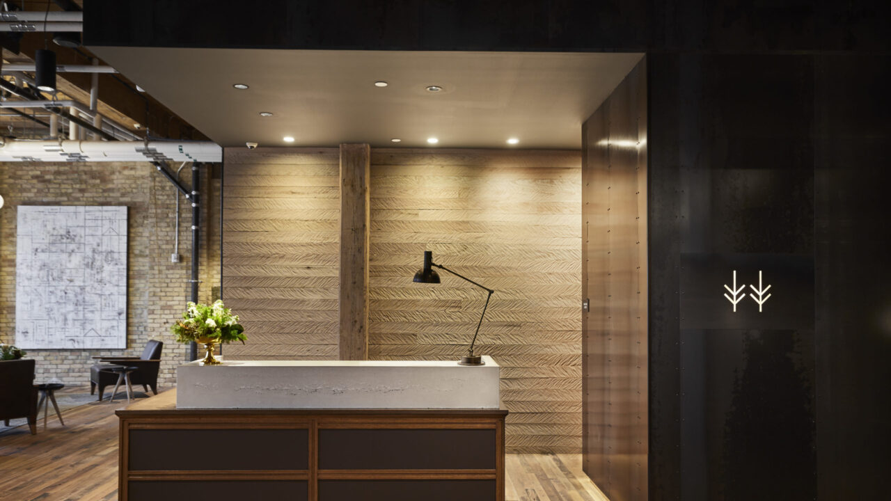 Small vase of white flowers on the front desk of our Minneapolis hotel