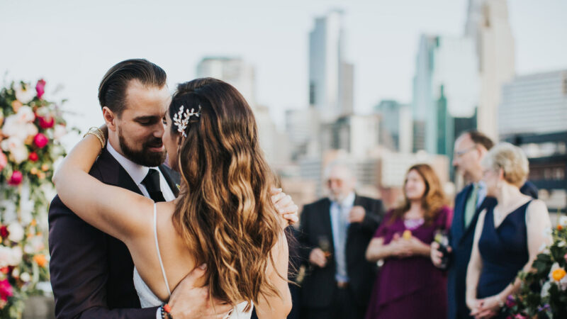 Bride and groom dancing together on our hotel rooftop in Minneapolis