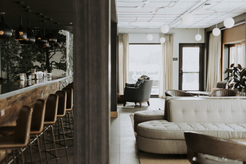 Chairs neatly aligned in our Minneapolis boutique hotel's rooftop bar and lounge