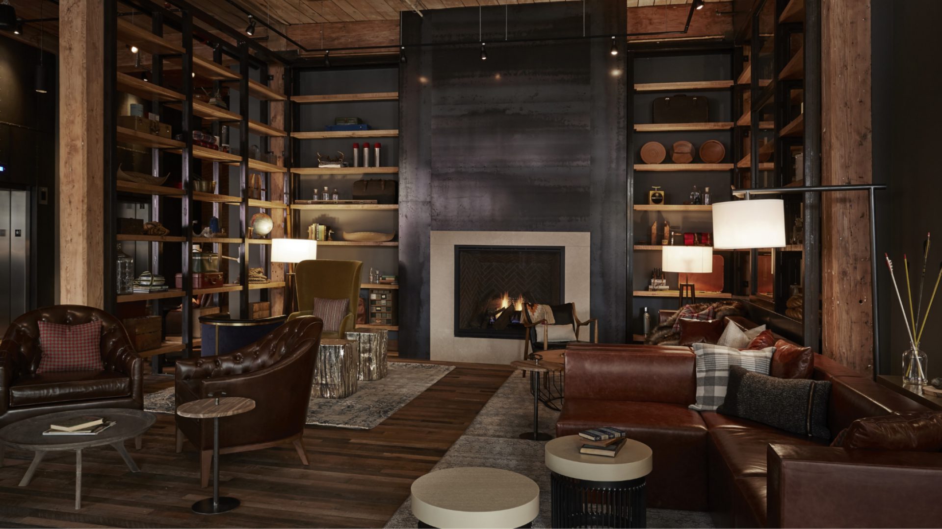 Dim and cozy lounge area with a fireplace at our downtown MPLS hotel